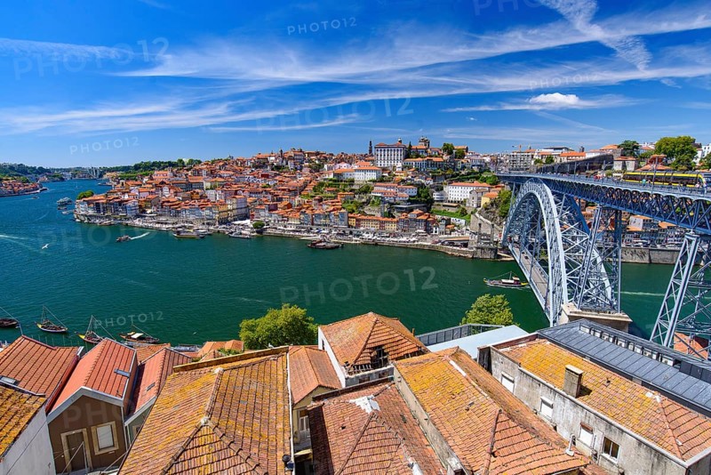 Dom Luis I Bridge, the River Douro, and the Ribeira district in Porto, Portugal, Europe