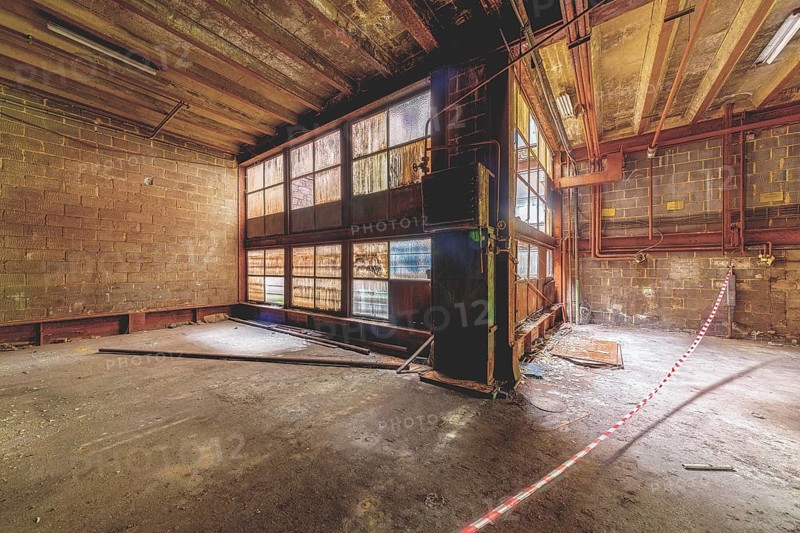 Interior of an abandoned building with wooden floor, rubble and light coming in through high windows, HF6, Lost Place, Seraing, Province of Liège, Belgium, Europe