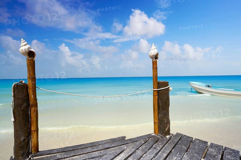 Holbox tropical Island wooden pier in Quintana Roo of Mexico