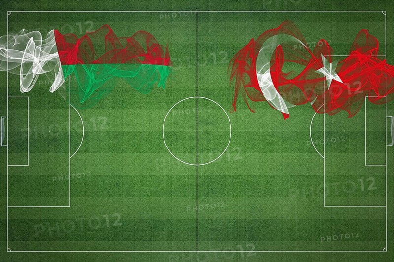 Madagascar vs Turkey Soccer Match, national colors, national flags, soccer field, football game, Competition concept, Copy space