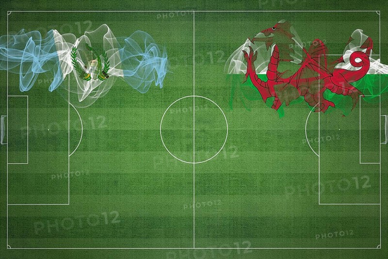 Guatemala vs Wales Soccer Match, national colors, national flags, soccer field, football game, Competition concept, Copy space