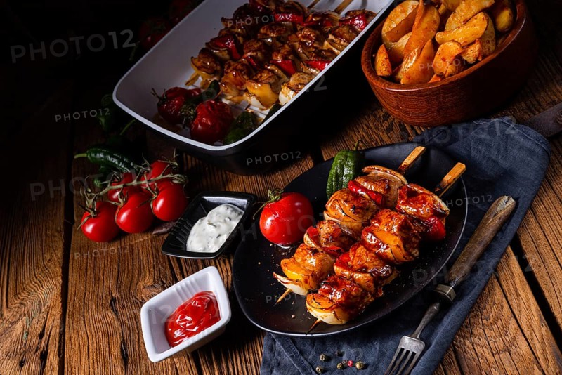 Marinated kebabs with meat and vegetables