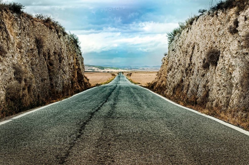 Old dramatic asphalt road
