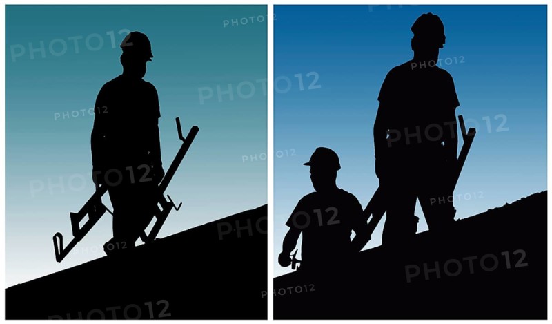 Construction workers work on building site
