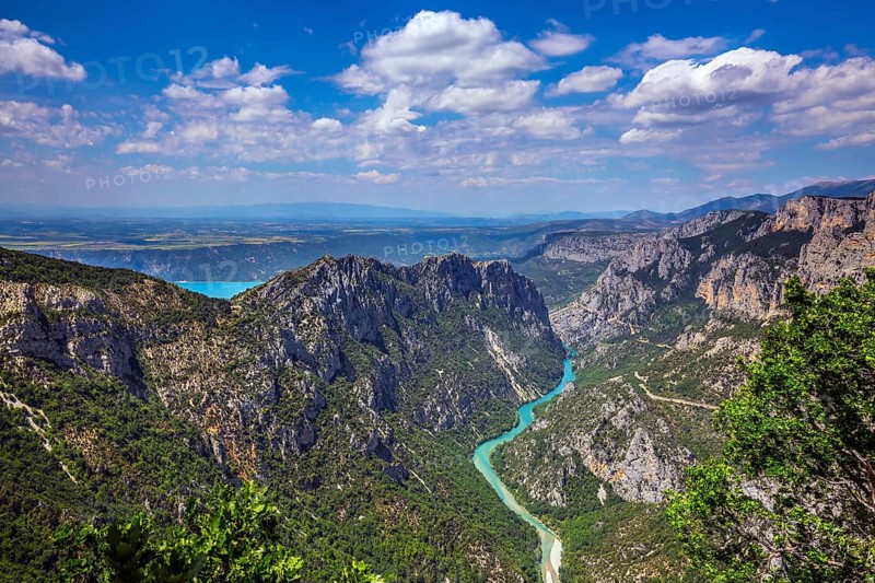 The largest alpine canyon Verdon spring. Turquoise water of the river is flowing at the bottom of the gorge. Canyon of Verdon, Provence