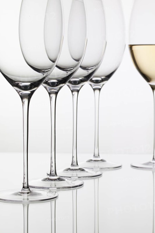Five glasses of wine and on the white background