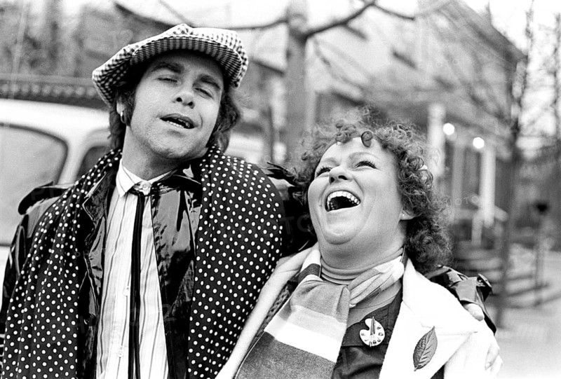 Elton John. English singer, songwriter born march 25 1947. Pictured wearing a chequered cap and a matching chequered scarf during a visit to Sweden 1978