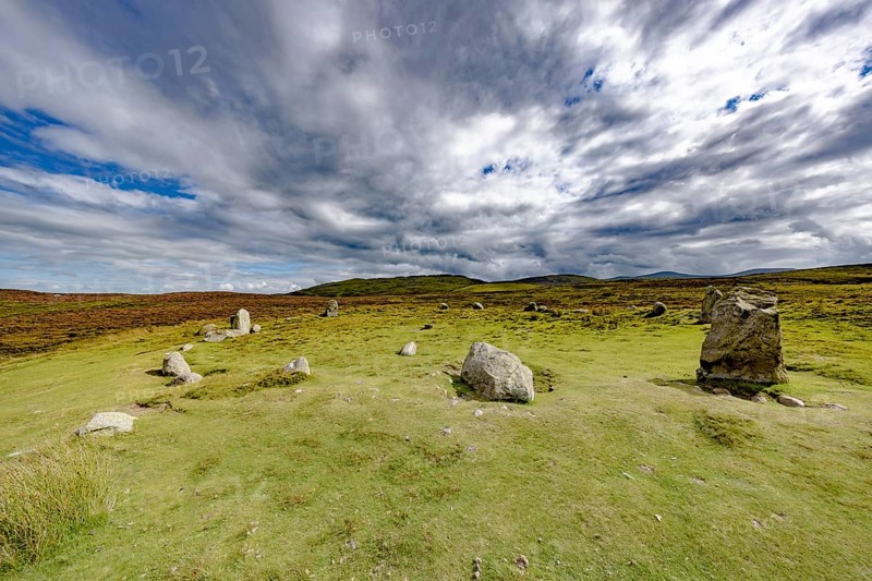 Druids Circle, stone circle in wide landscape with pastures in the mountains, Penmaenmawr, Dwygyfylchi, Caernarfonshire, Conwy County Borough, Wales, Great Britain