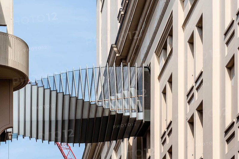 London, UK, May 15, 2019: Modern design bridge between two buildings in Covent Garden. Located in the West End of London, Covent Garden is renowned for its luxury fashion and beauty stores, restaurants and theatres