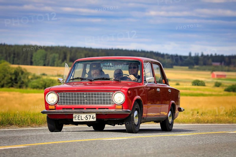Driving red Lada 1200 on Maisemaruise 2019 car cruise. Lada 1200 was manufactured by the Russian AvtoVAZ in 1970-88. Vaulammi, Finland. Aug 3, 2019
