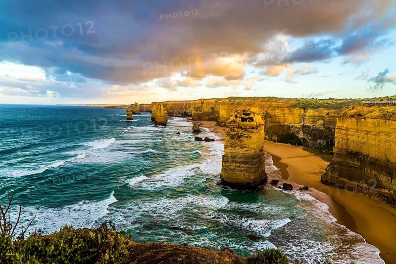 Fantastic morning light on the Pacific coast about Melbourne. The well-known rocks Twelve apostles in an ocean storm surf. Travel to Australia. Concept active and phototourism