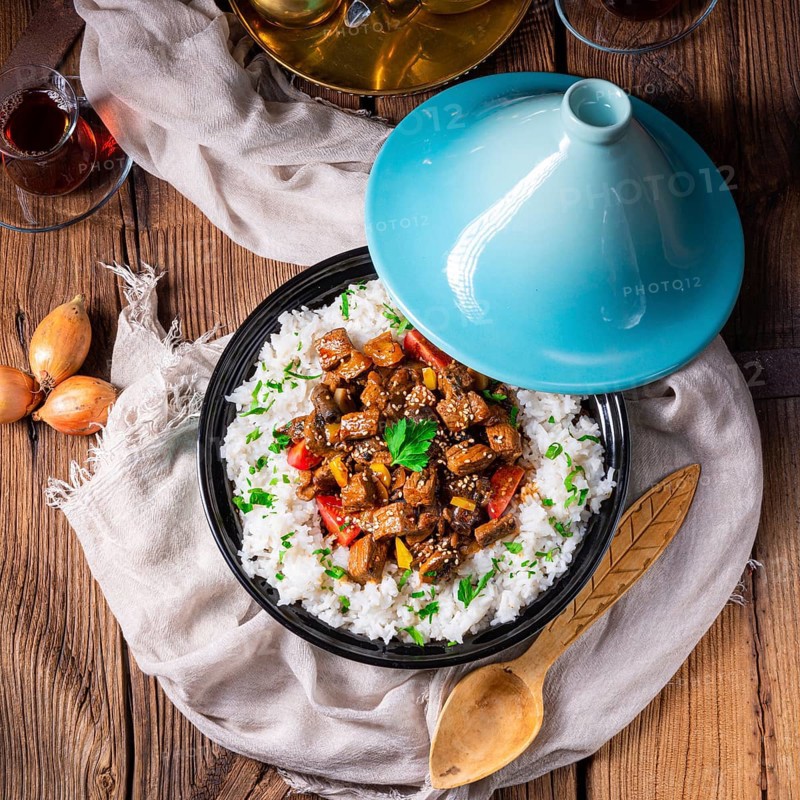 Tajin beef stew with rice, peppers and sesame seeds