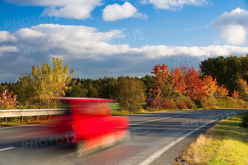 Speed car on a road in Krkonose mountain, Czech Republic, Europe