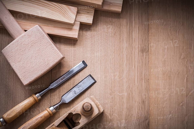 Variation of wooden joiner??™s working tools on wood board construction concept