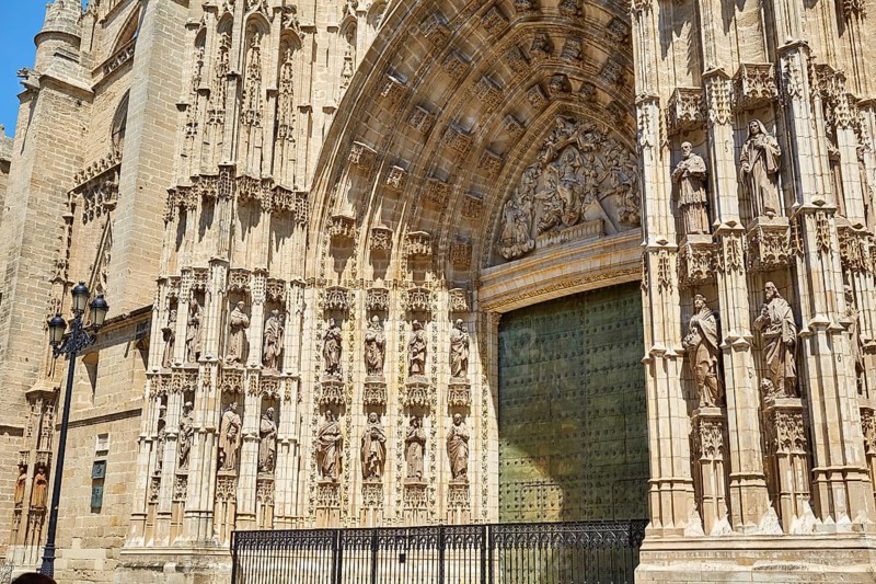 Seville cathedral facade in Constitucion avenue of Sevilla Andalusia Spain