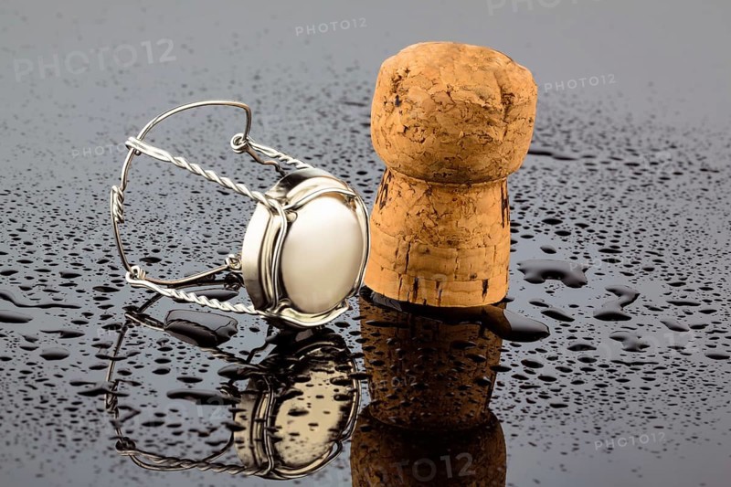 Champagne cork and agraffe, symbolic photo for celebrations, enjoyment and alcohol consumption