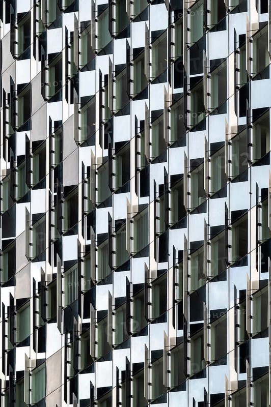 Brussels European Quarter, Belgium, March 15, 2023, Abstract patterns and lines of windows and shutters of a contemporary apartment block, Europe