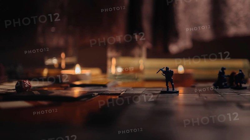 Crossbowman, Dungeons and Dragons board game in the evening time