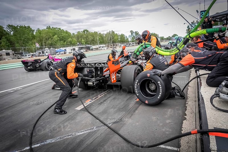 SANTINO FERRUCCI (14) of Woodbury, Connecticut comes down pit road for service during the XPEL Grand Prix at Road America in Elkhart Lake, WI