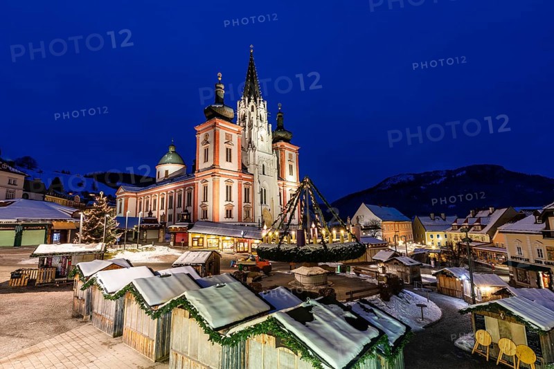 Advent atmosphere, world's largest hanging Advent wreath at the Christmas market in front of the basilica of Mariazell, blue hour in the early morning, Mariazell, Styria, Austria, Europe