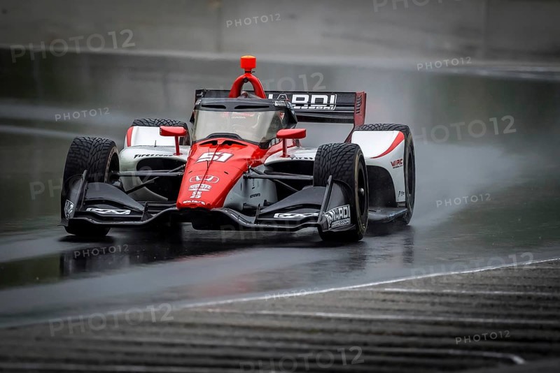 LUCA GHIOTTO (R) (51) of Arzignano, Italy comes through turn 12 (Canada Corner) during a wet practice session for the XPEL Grand Prix at Road America in Elkhart Lake, WI