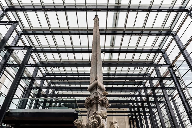 Ljubljana, Slovenia, 04 07 2018: Fountain, column and glass and steel construction at the National Gallery of Slovenia, Europe