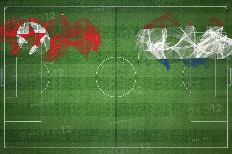 North Korea vs Netherlands Soccer Match, national colors, national flags, soccer field, football game, Competition concept, Copy space