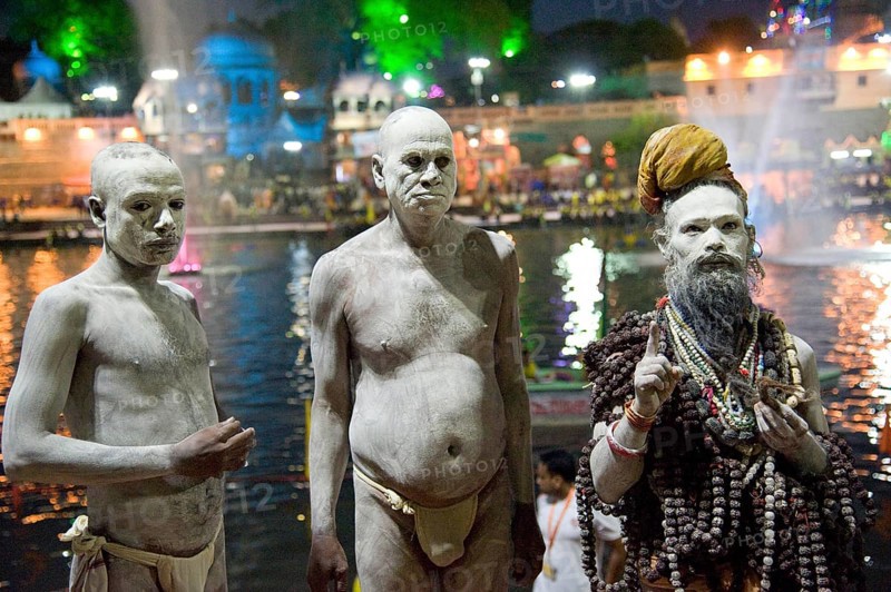 Naga sadhu standing near shipra river, madhya pradesh, india, asia