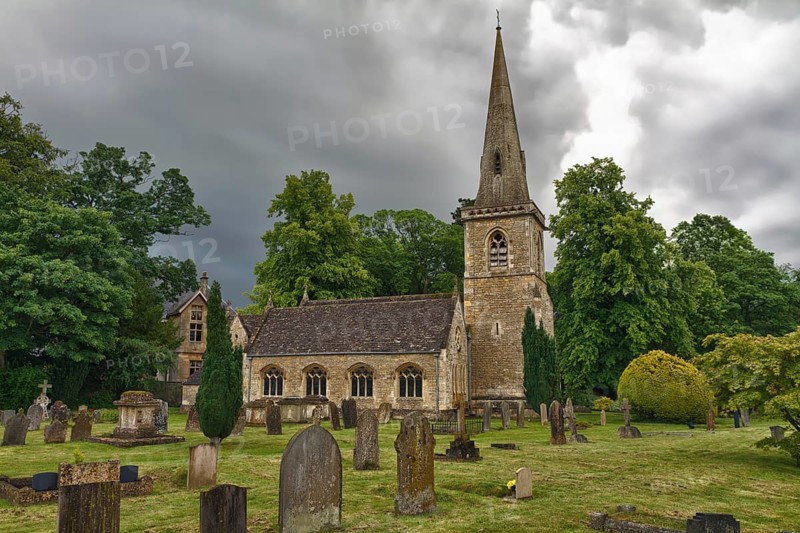 St Mary's Church with graveyard in Cotswolds, Lower Slaughter, UK