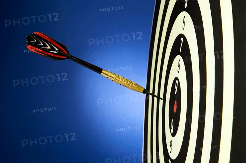 A dart game with a dart that hit the bull's eye. Austria