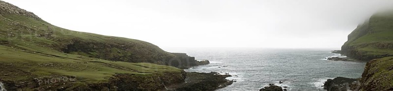 Typical landscape on the Faroe Islands, with green grass and rocks on Suduroy, Suduroy, Faroe Islands, Denmark, Europe