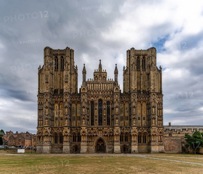 Wells, United Kingdom, 1 September, 2022: view of the two spires and front of the 12th-centruy Gothic Wells Cathedral in Somerset, Europe