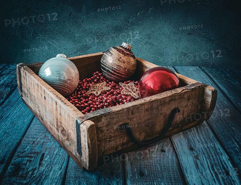 Christmas decorations in an old wooden box