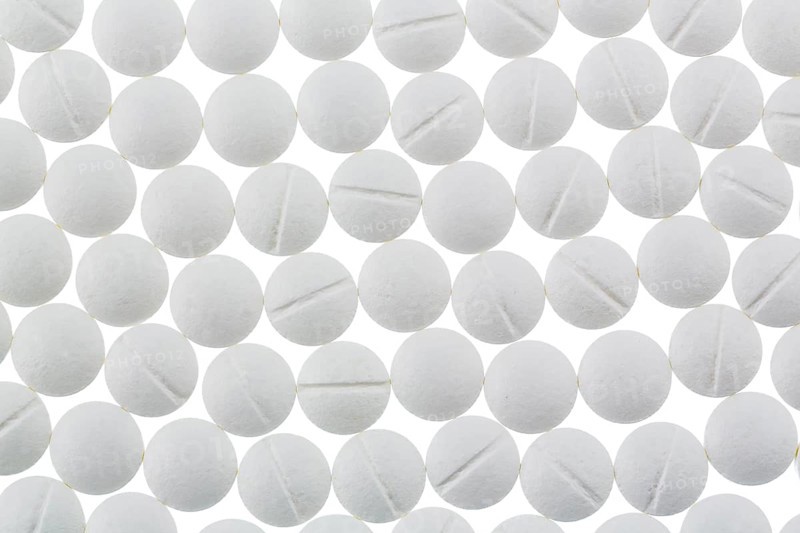 White tablets, symbolic photo for medicine, remedies and tablet addiction