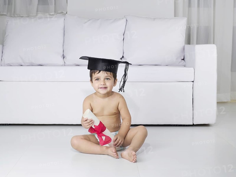 Baby holding degree certificate, MR#779O