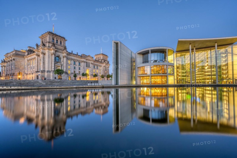 The Reichstag and part of the Paul Löbe House on the Spree in Berlin at dusk
