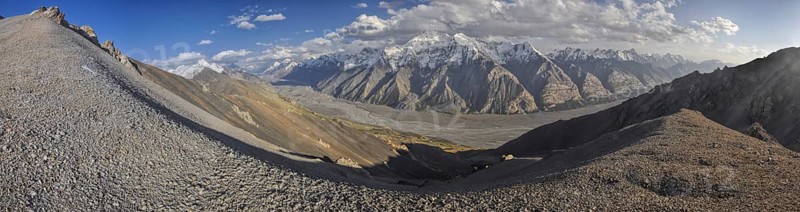 Scenic panorama of valley and mountain peaks in Tien-Shan mountain range in Kyrgyzstan