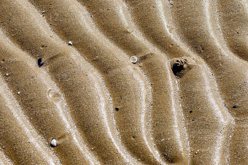 Sand texture on the beach close to the Adriatic sea in Italy