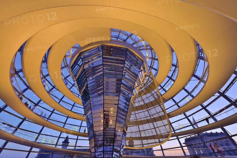 Reichstag building in Berlin. The large glass dome at the very top of the Reichstag has a 360-degree view of the surrounding Berlin cityscape. The main hall of the parliament below can also be seen from inside the dome, and natural light from above radiates down to the parliament floor. The Reichstag building is a historical edifice in Berlin, Germany, constructed to house the Imperial Diet of the German Empire, Europe