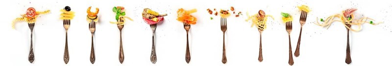 Italian food collage. Pasta design elements. Many forks with pasta and various addings, shot from the top on a white background