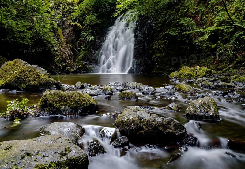 A view of the picturesque Gleno Waterfall in the Glens of Antrim near Larne
