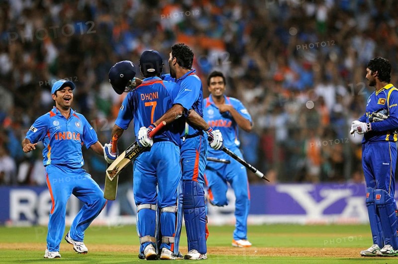 Mahendra Singh Dhoni 2R team mate Yuvraj Singh R Piyush Chawla R Ashwin L celebrate ICC Cricket World Cup 2011 final Wankhede