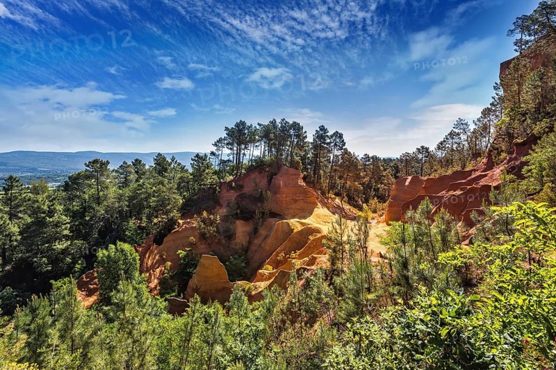 Picturesque pit of production of ochre - natural paint. Roussillon, Red village of Provence