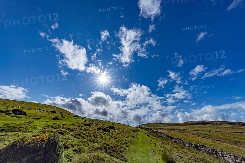 Hilly landscape with green meadows and stone wall, dry stone wall on the edge of Snowdonia National Park, Penmaenmawr, Dwygyfylchi, Caernarfonshire, Conwy County Borough, Wales, United Kingdom, Europe