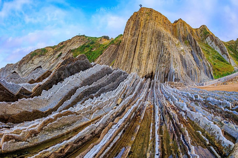 The most unusual beach in the Basque Country - Itsurun. Flysch - unique landscape of underwater rocks exposed at low tide. Magical landscape