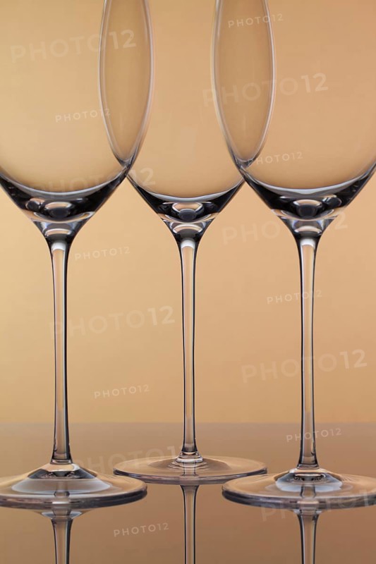 Three empty glasses of wine on a clean background