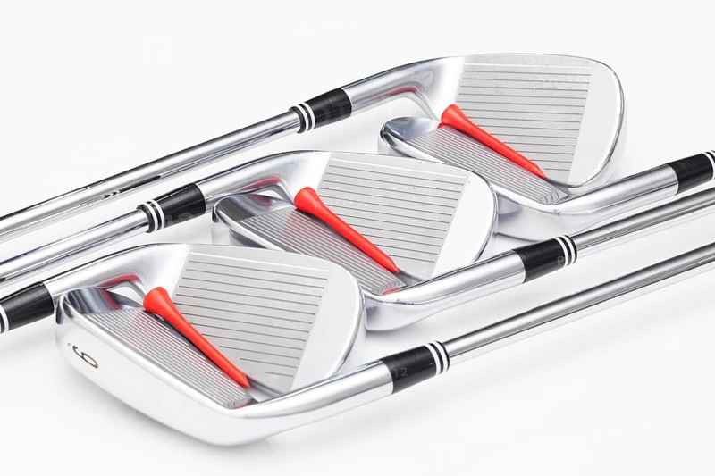 Titanium golf clubs on the white background