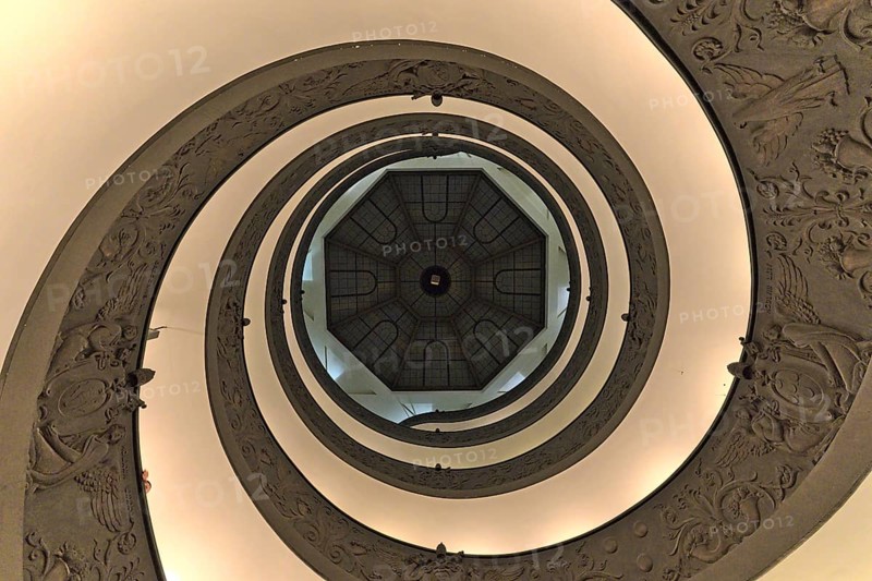 Inside of the Vaticans museums at the famous stairs near the exit. Bottom-up shot