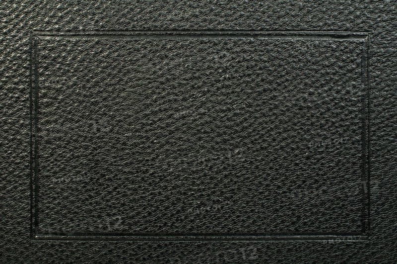 Old vintage black leather background. Studio shot
