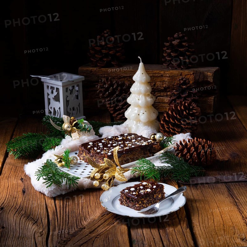 Christmas poppy seed cake with chocolate, nuts and sultanas